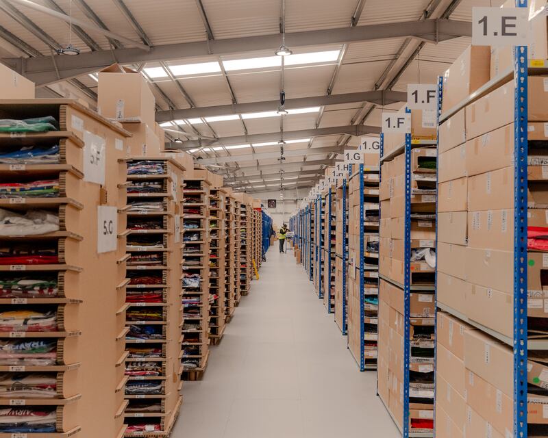 Rows of over one million shirts stored at Classic Football Shirts in Hyde, England. Photograph: Jack Roe/The New York Times