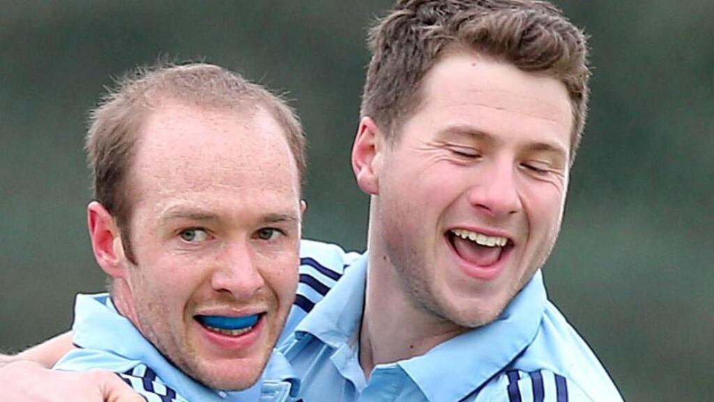 Andy Ewington (left) celebrates another goal for in-form Monkstown, against Pembroke Wanderers. Photograph: Dan Sheridan/Inpho