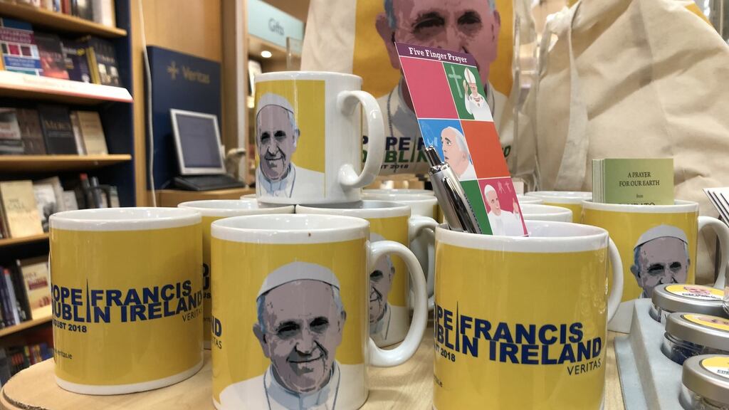 Pope Francis mugs among some of the range of Pope Francis memorabilia and souvenirs on sale at Veritas earlier this year . Photograph: Bryan O’Brien / The Irish Times