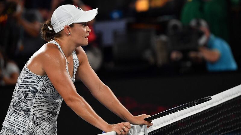 Ashleigh Barty waits for Madison Keys at the net after her semi-final win. Photograph: Paul Crock/Getty/AFP