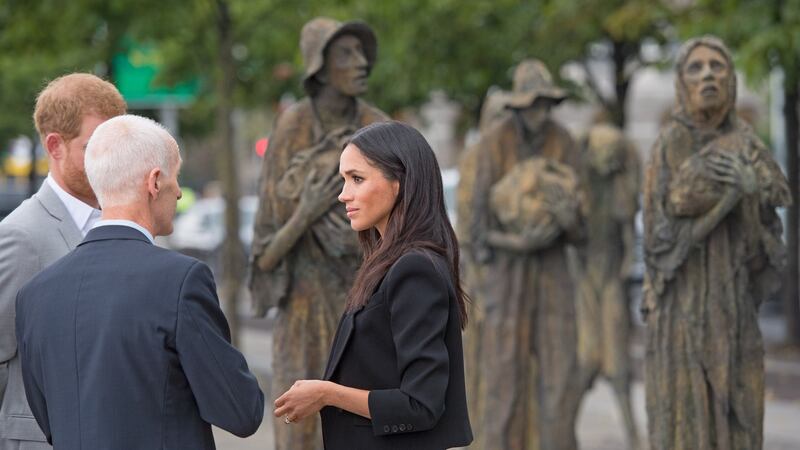 Meghan Markle visiting the Famine Memorial on the bank of the River Liffey. Photograph: Zak Hussein/Getty Images)