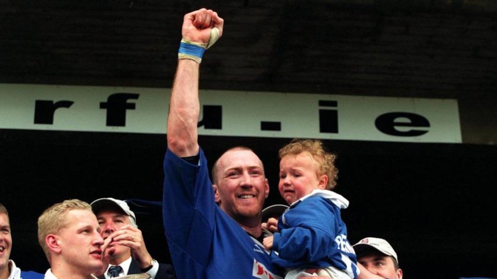 St Mary’s captain Trevor Brennan with his son Daniel after defeating Lansdowne in the club final in 2000. Photograph: INPHO/Billy Stickland