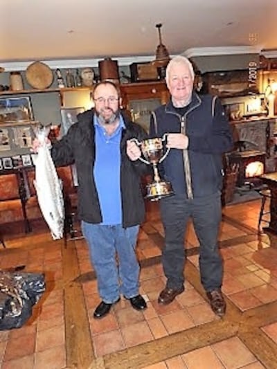 Local angler Michael O’Dwyer (left) with the first official wild salmon of 2019 from an open fishery on Lough Currane, Co Kerry, with Waterville Inn landlord, Damian Duff