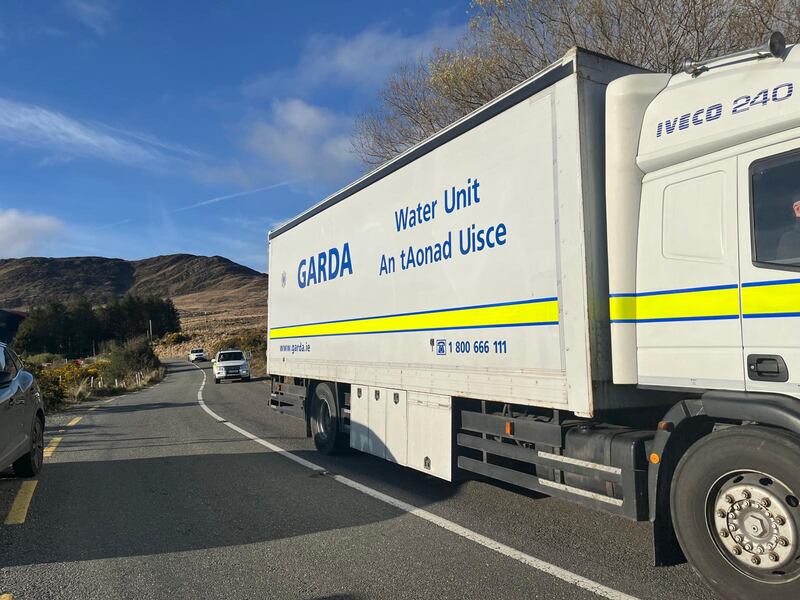 The Garda Water Unit near farmland owned by missing farmer Michael Gaine outside Kenmare, Co Kerry, on Wednesday, March 27th. Photograph: Liam Coates