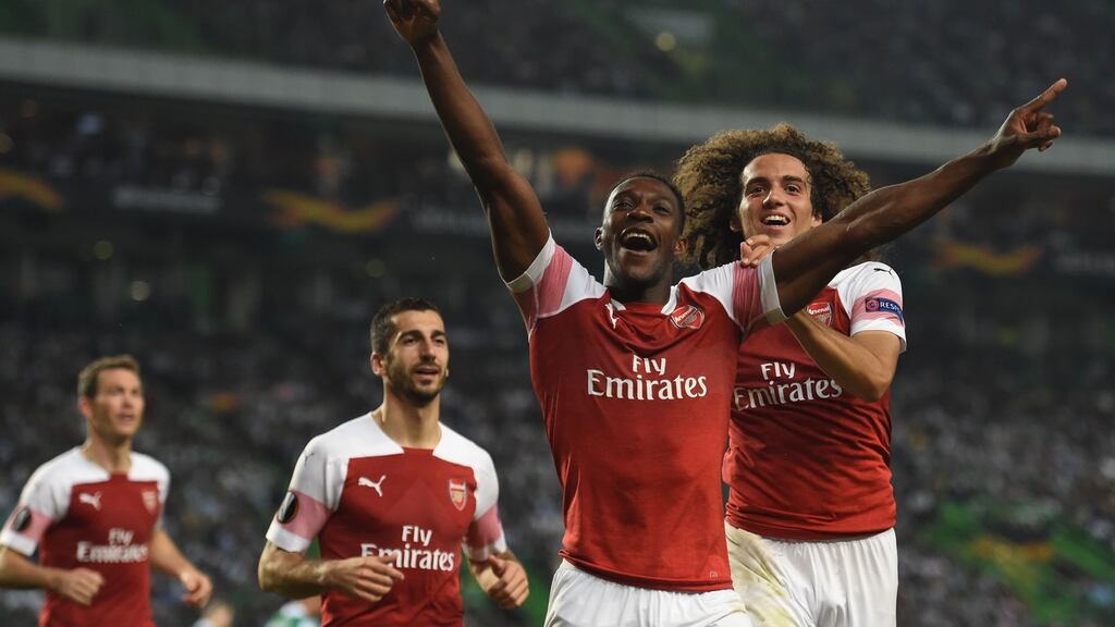 Danny Welbeck celebrates his winner for Arsenal in Lisbon. Photograph: Francisco Leong/AFP/Getty