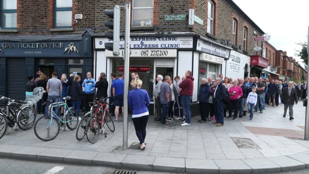 Dublin GAA fans queue down Belvedere Road as they wait to to purchase tickets at the GAA ticket office on Dorset Street for this Saturday’s eagerly-awaited All-Ireland football semi-final replay. Photograph: Maxpix.