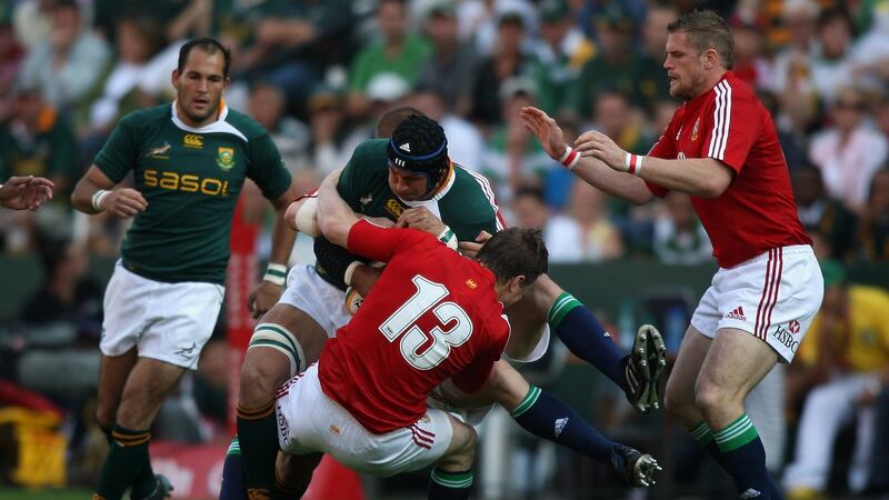 Brian O’Driscoll tackles South Africa’s Pierre Spies during the First Test match in Durban in 2009. Photograph: David Rogers/Getty Images