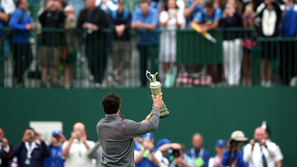 Rory McIlroy shows off the Claret Jug after winning the 2014 British Open  at Royal Liverpool Golf Course in Hoylake. Photograph: Getty