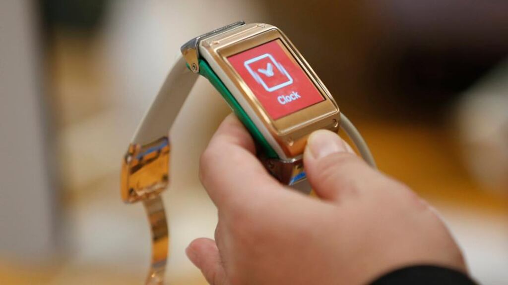 A man tries out a Samsung Electronics’ Galaxy Gear smartwatch at the company’s headquarters in Seoul this month.  Photograph: Kim Hong-Ji/Reuters
