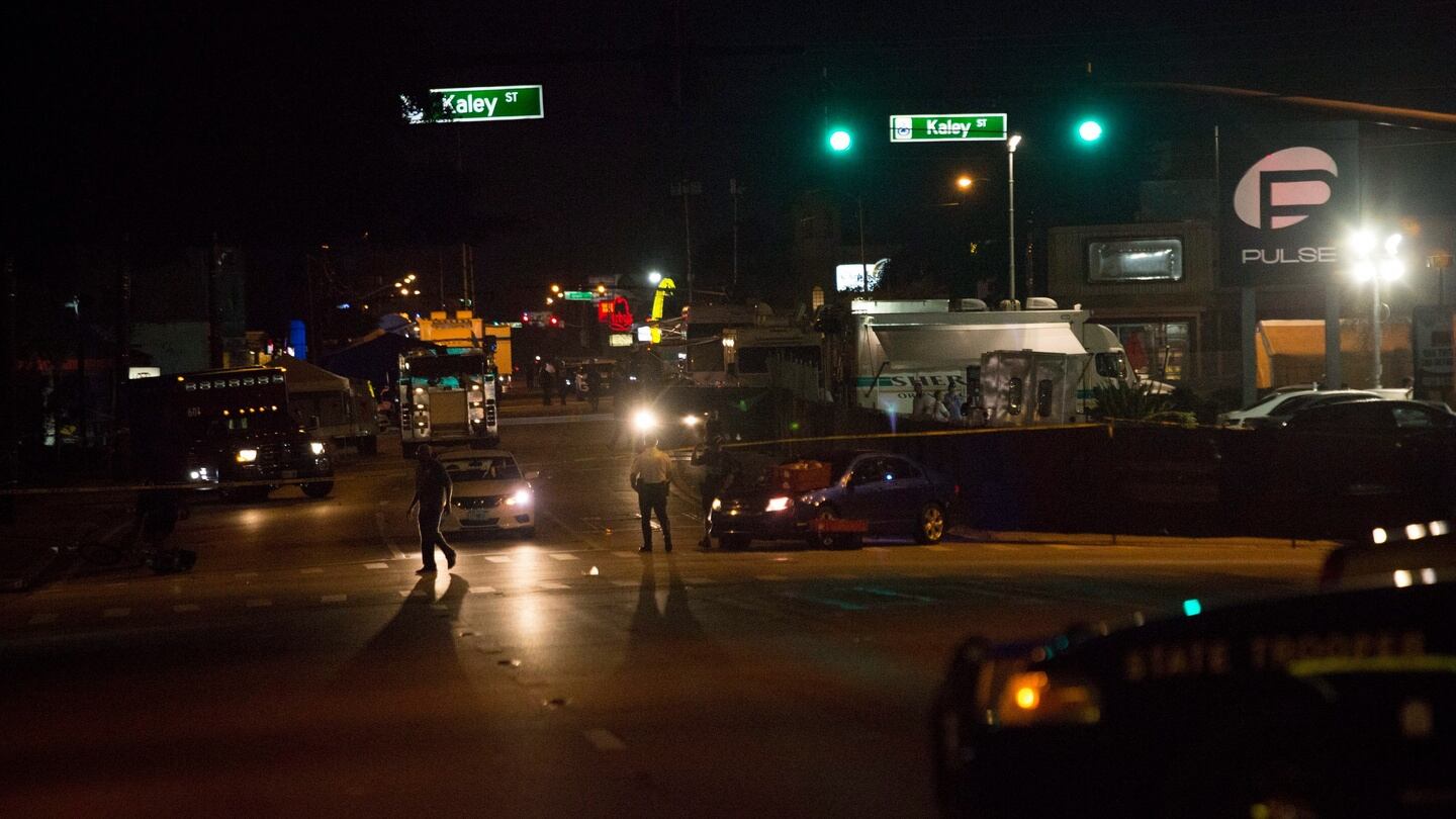 Police and rescue officers monitor the scene in the aftermath of a mass shooting at Pulse nightclub, in Orlando. Photograph: John Taggart/EPA