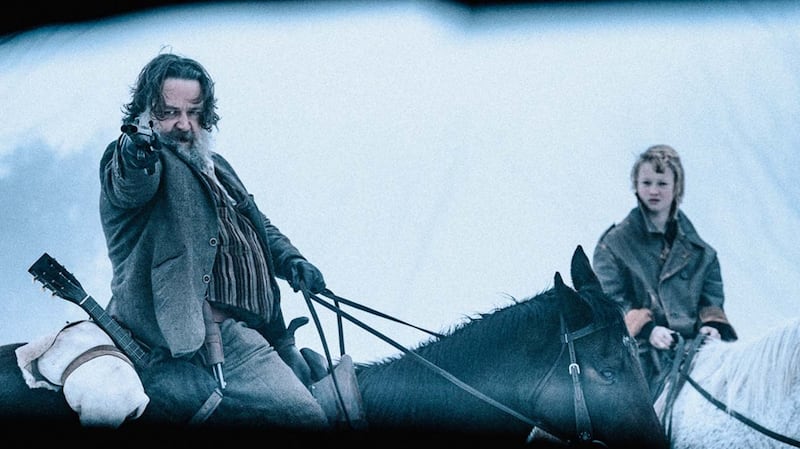 Russell Crowe and Orlando Schwerdt in True History of the Kelly Gang