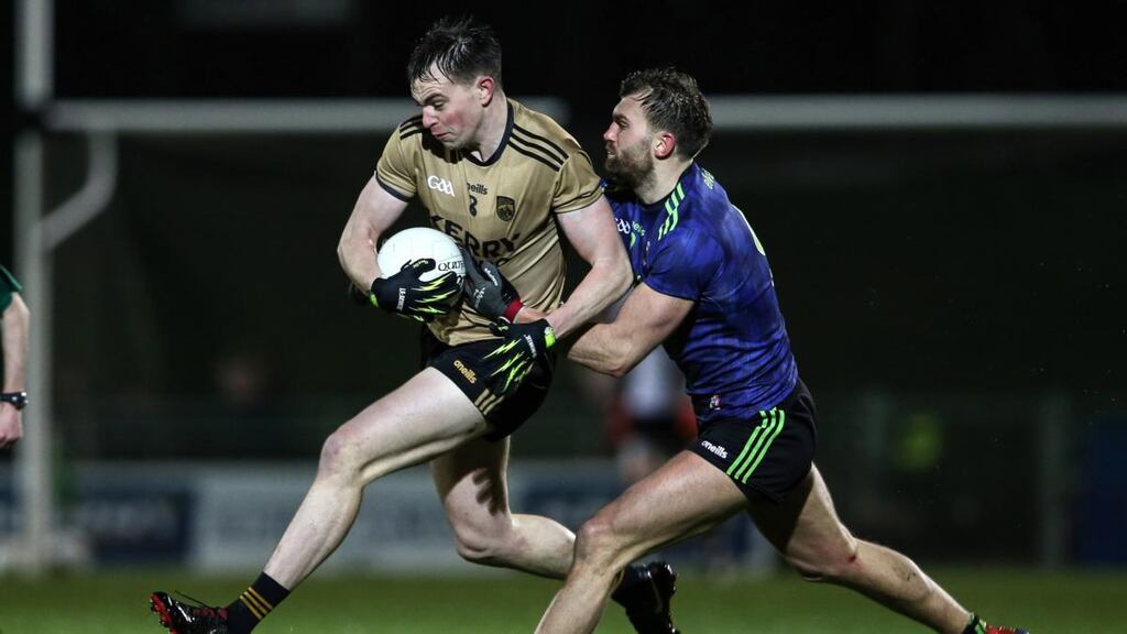 Kerry’s Jack Barry is put under pressure by Aidan O’Shea of Mayo during the Allianz Football League Division 1 match at Austin Stack Park in Tralee. Photograph: Cathal Noonan/Inpho