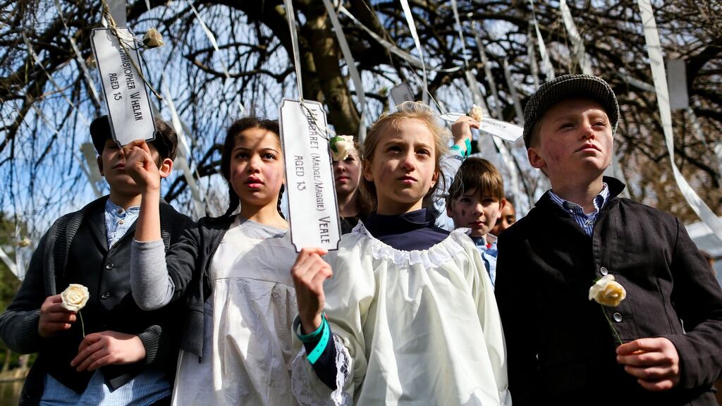 Children from the Rainbow Drama School commemorate the children who died in the Rising, one of many events in St Stephen’s Green, Dublin. Photograph:  Maxwells