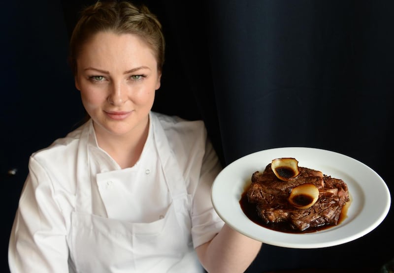 Grainne O’Keefe’s chargrilled rib-eye with grilled onions, chimichurri. Photograph: Dara Mac Dónaill