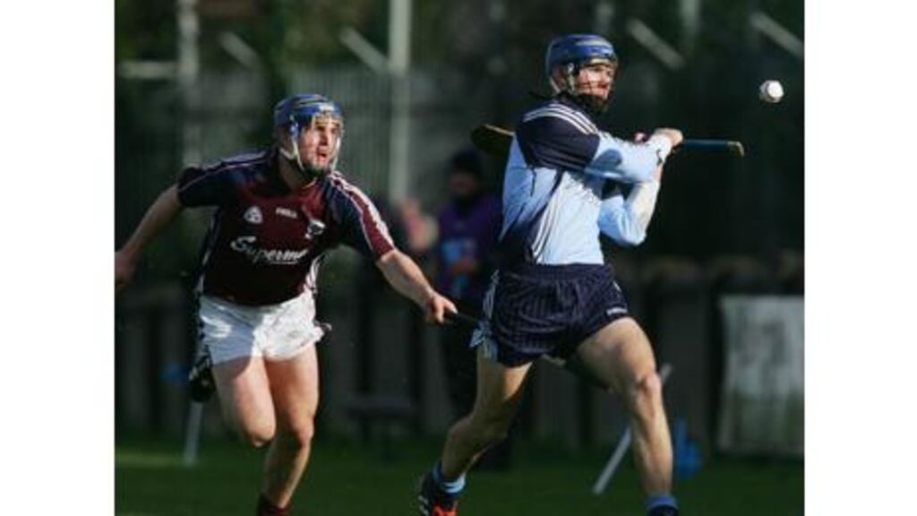 Dublin's Declan Qualter is pursued by Galway's David Forde
during yesterday's National Hurling League Division One B clash at
Parnell Park. Dublin won the encounter, 2-7 to 1-8. Photograph:
Bryan O'Brien