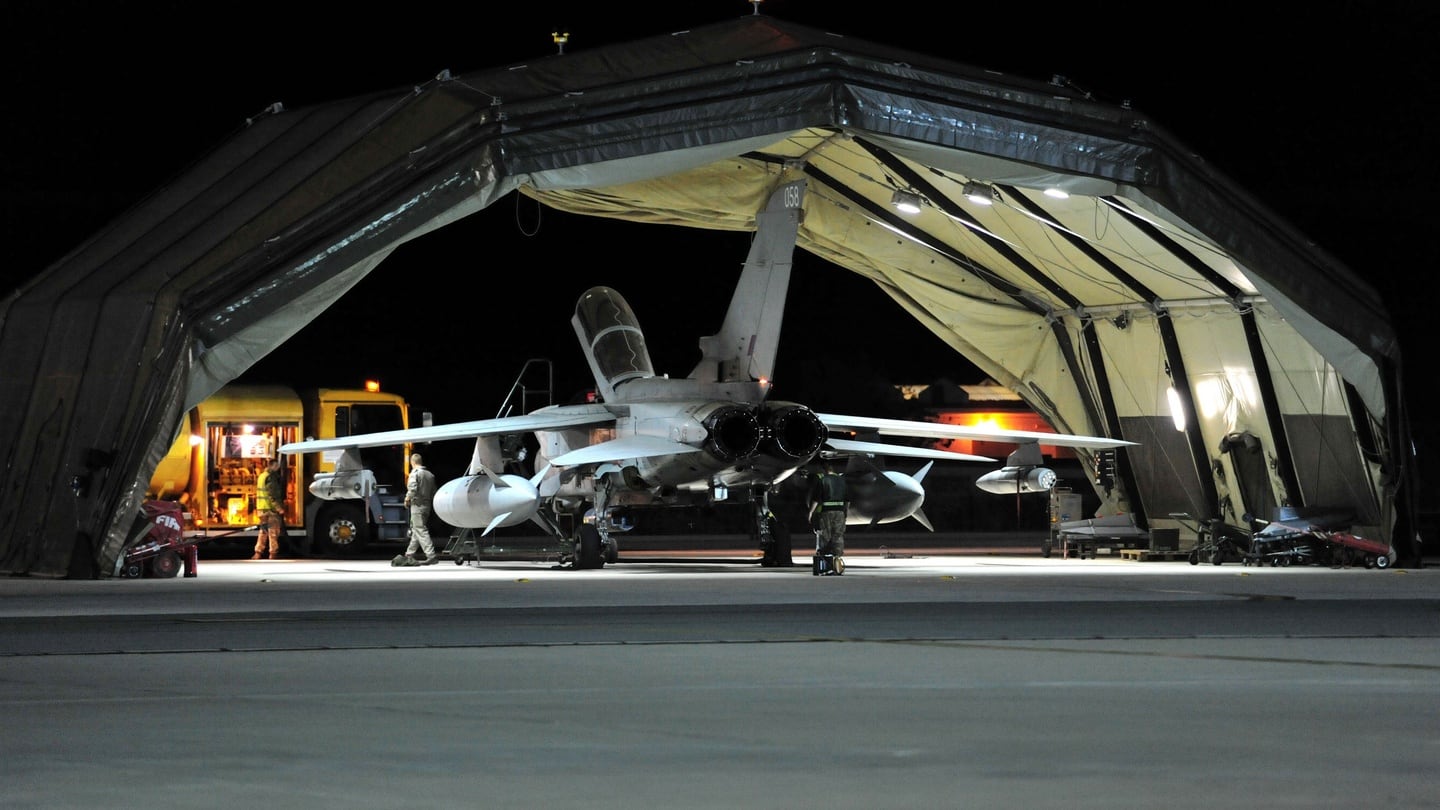 Ground crew work on a RAF Tornado GR4 after it returned to RAF Akrotiri in Cyprus, as jets carried out the first British bombing runs over Syria, the ministry of defence confirmed. Photograph: PA