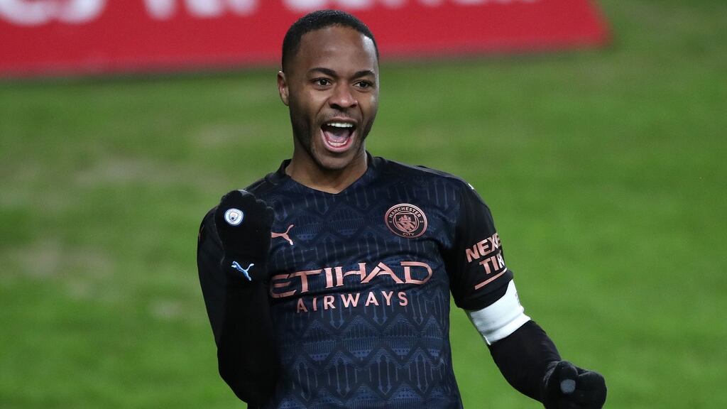 Manchester City’s Raheem Sterling celebrates scoring their second goal during the FA Cup fifth-round match against Swansea City at Liberty Stadium. Photograph: Nick Potts/PA Wire