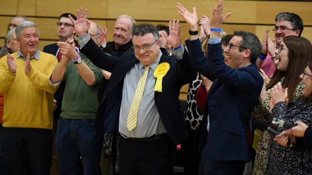 Stephen Farry of the Alliance Party celebrates after his win in North Down. Photograph: Michael Cooper/PA Wire