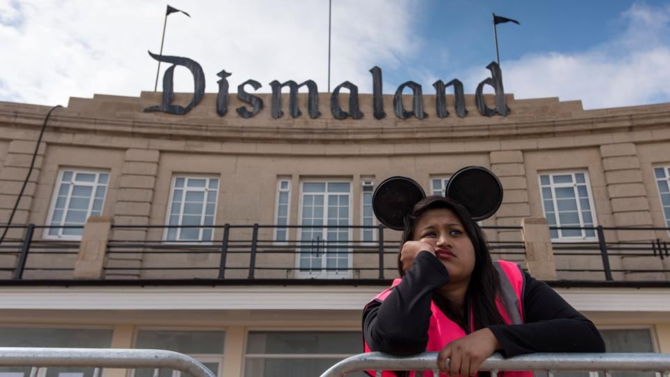 A steward outside Bansky’s ‘Dismaland’ exhibition in Weston-Super-Mare. Photograph: Matthew Horwood/Getty Images
