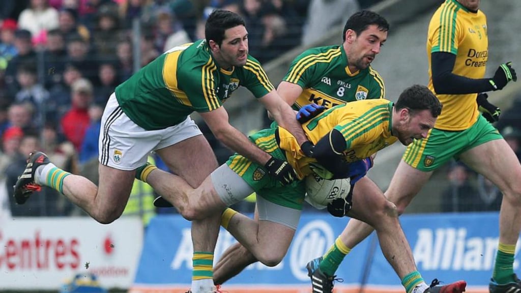 Martin McElhinney in action against Kerry’s Bryan Sheehan and Anthony Maher. “We are not safe. We have to go and put on a performance against Mayo and that is going to be hard without Michael Murphy.” Photo: Lorraine O’Sullivan/Inpho