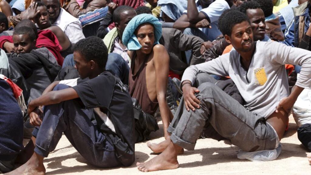 Migrants wait to be transported to an immigration centre in the coastal city of Misrata, Libya. Photograph: Ismail Zitouny/Reuters