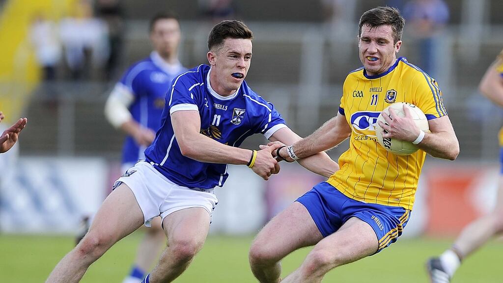 Cavan’s Niall Murray with Roscommon’s Cathal Cregg during the All-Ireland championship qualifier at Kingspan Breffni Park in 2015. Roscommon won 3-17 to 1-16. Photograph: Tommy Grealy/Inpho