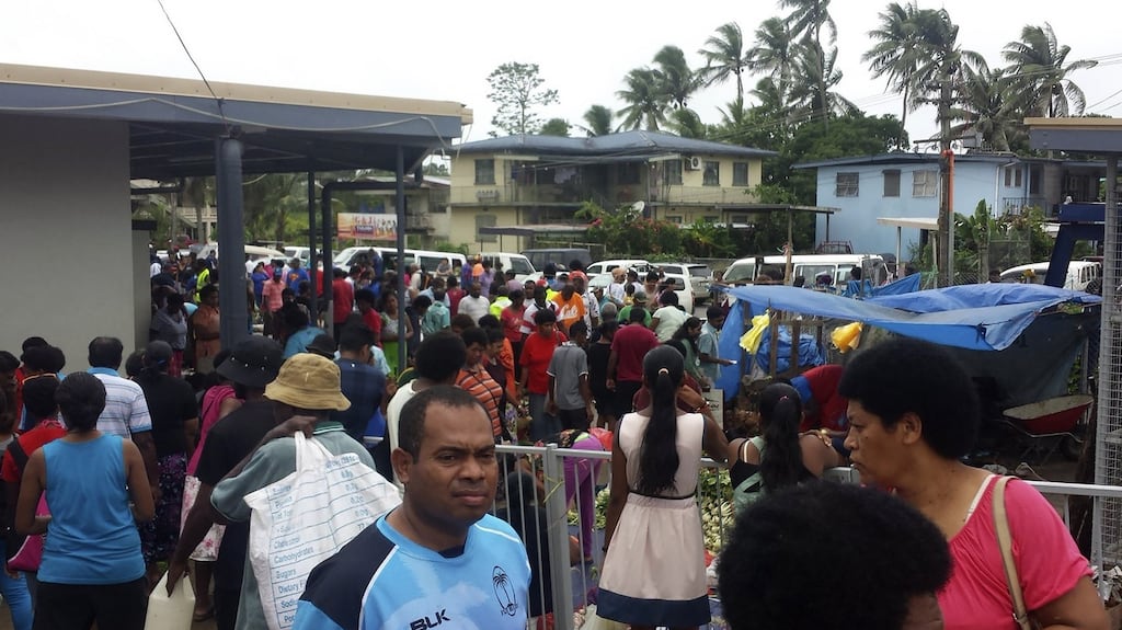Residents gather at a market as they prepare for Cyclone Winston in the Fijian town of Nausori. Photograph: Kris Parsad/AFP/Getty Images