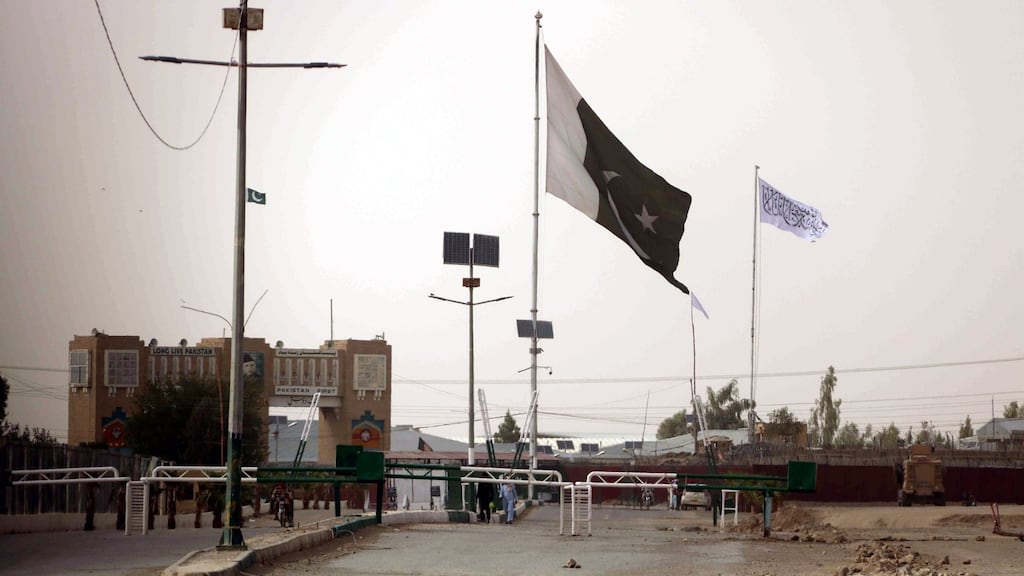 A Taliban flag (on right) is raised on the Afghan side of the Pakistani-Afghan border at Chaman, Pakistan on Wednesday. Photograph: Akhter Gulfam/EPA