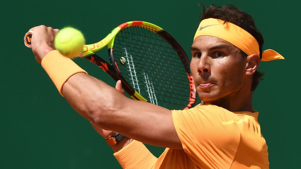 Spain’s Rafael Nadal plays a backhand return to Austria’s Dominic Thiem during their singles tennis match at the Monte Carlo Masters tournament in Monaco. Photograph: Yann Coatsaliou/AFP/Getty Images