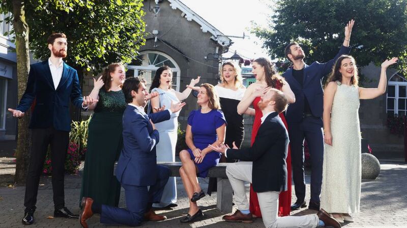 Artists from the Wexford Factory pictured serenading Áine Brassill (Partner PwC) on the streets of the town today to mark the start of the 2024/25 Wexford Festival Opera’s Academy for young Irish and Irish based singers, repetiteurs and stage managers which is supported by PwC. Photograph: Leon Farrell/Photocall Ireland