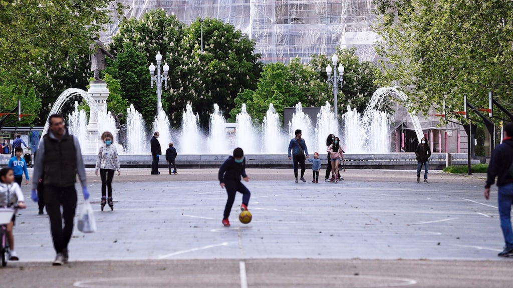 Families play in a park in Valladolid in Spain. Children  were allowed out of their own homes for an hour per day for the first time after 44 days on Sunday. Photograph: Nacho Gallego/EPA