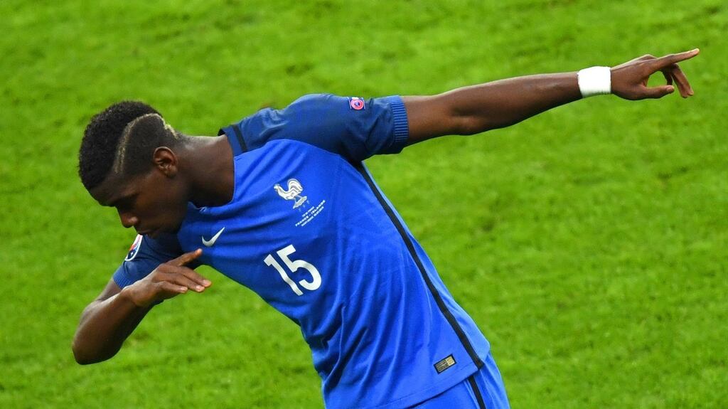 France’s midfielder Paul Pogba celebrates after scoring his team’s second goal against Iceland. Photograph: Getty Images