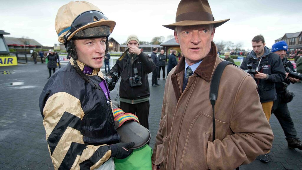 David Mullins with his uncle, trainer Willie Mullins. The Grand National-winning jockey will attempt to foil his uncle’s plans to win the BHP Irish Champion Hurdle in Leopardstown for a seventh year in a row on Sunday. Photograph: Morgan Treacy/Inpho