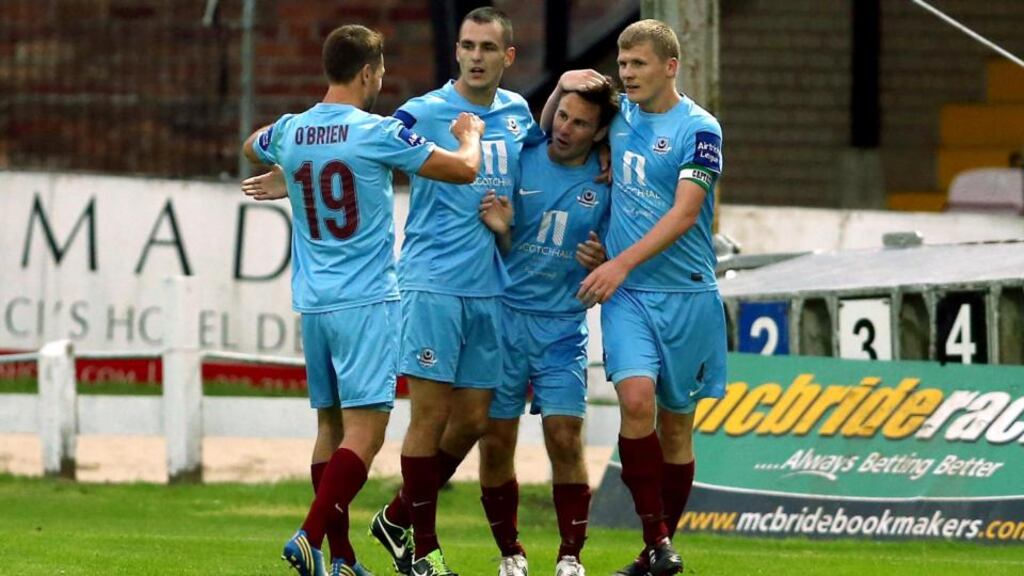 Drogheda United’s David Cassidy (second right) celebrates with his team-mates after scoring against Derry City at the Brandywell. Phogograph: William Chrerry/Presseye/Inpho