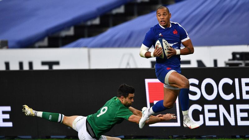 France winger Gaël Fickou runs through the Ireland defence before setting up his side’s first try for Antoine Dupont. Photograph: Anne-Christine Poujoulat/AFP via Getty Images
