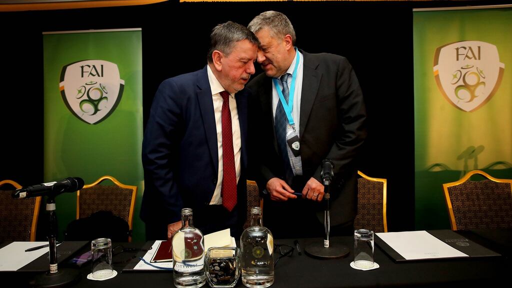 FAI outgoing president Donal Conway with acting chief executive Paul Cooke at the FAI’s reconvened agm at Citywest Hotel, Saggart, Co Dublin. Photograph: Ryan Byrne/Inpho