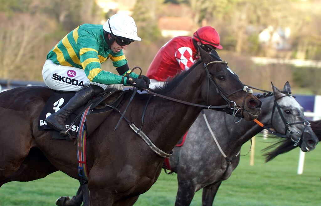 Saint Roi ridden by Mark Walsh (left) wins the Brand New Racing Post App Novice Chase with Fil Dor ridden by Jack Kennedy third at last year's Leopardstown Christmas festival. Photograph: Brian Lawless/PA Wird/PA Images