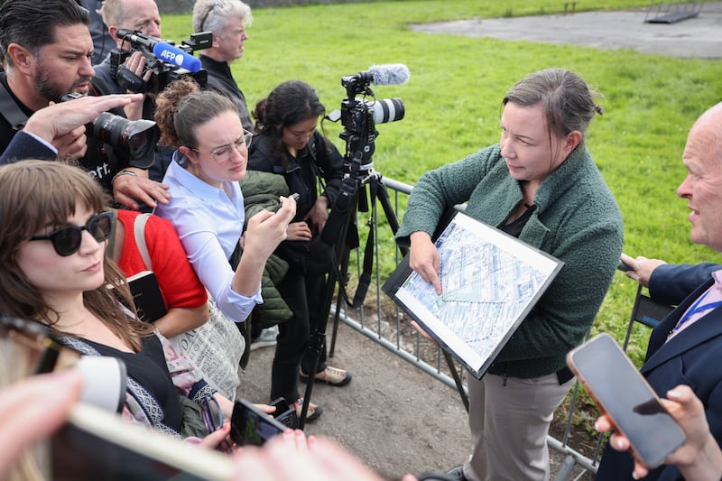 Dr. Niamh McCullagh, Senior Forensic Consultant to the Office of the Director of Authorised Intervention, Tuam (ODAIT) shows where excavations will commence at the excavation of the site of the former Mother and Baby Institution, Tuam