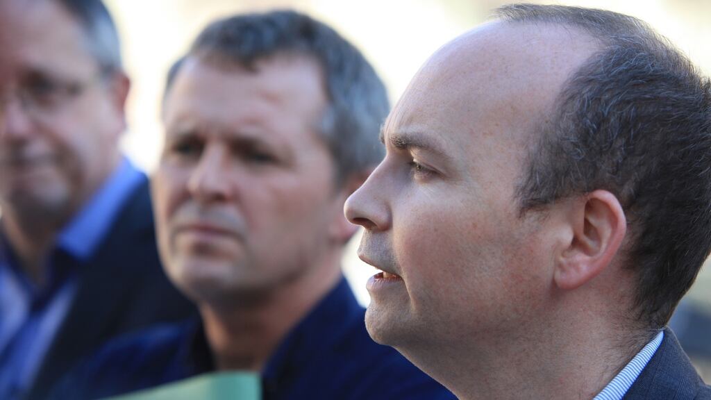 People Before Profit TD Richard Boyd Barrett (left) and Solidarity TD Paul Murphy talk to the media on the plinth at the Dail. Photograph: Garrett White/Collins Photo Agency