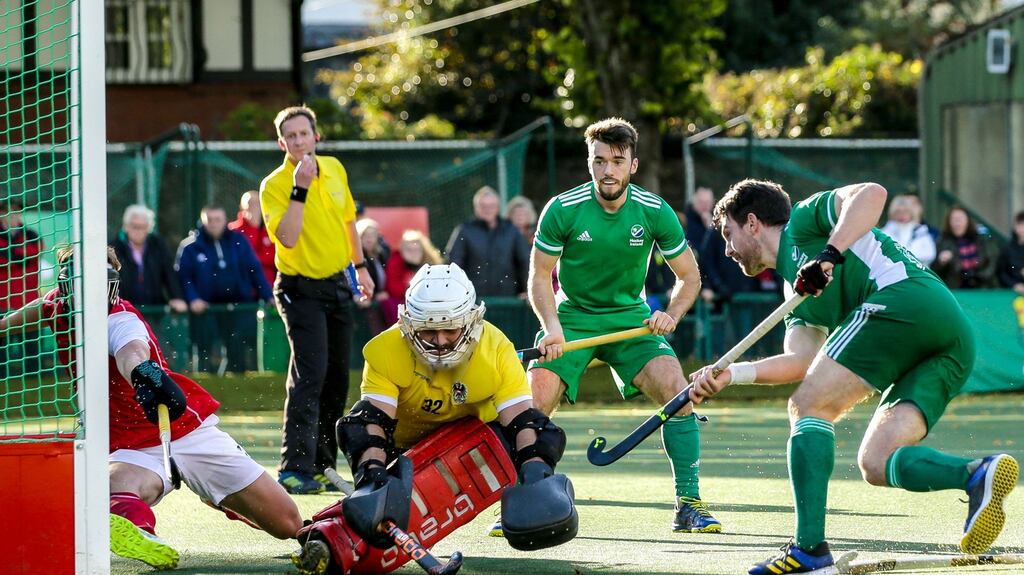 Jeremy Duncan scores Ireland’s third goal in the third-place playoff against Austria at the World Cup qualifier at the Sport Wales National Centre in Cardiff. Photograph: Robbie Stephenson/Inpho