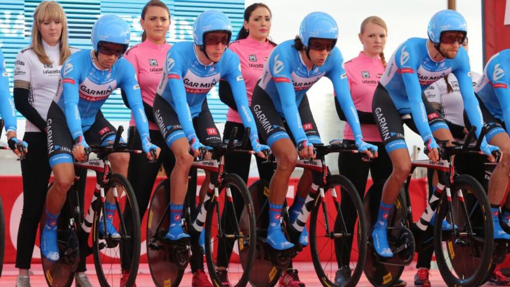 Garmin Sharp’s Dan Martin (second from left) at the start of the team time trial  at  the  Giro d’Italia in Belfast.  Photograph: Niall Carson/P