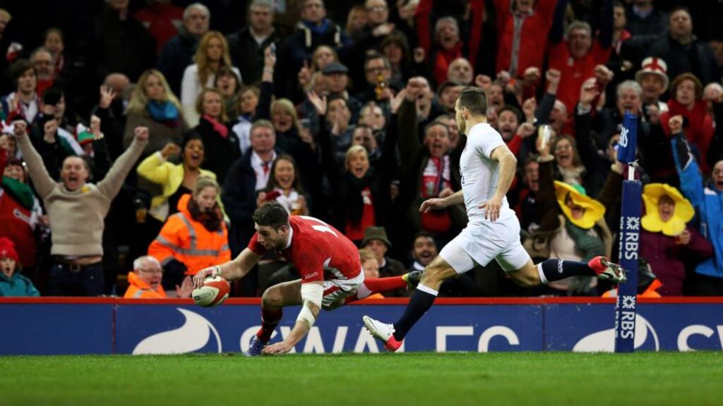 Alex Cuthbert of Wales touches down to score his team's second try against England at the Millennium Stadium. Photograph: Alex Livesey/Getty Images