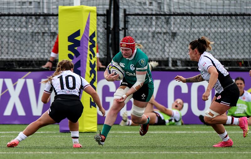 Ireland's Aoife Wafer comes up against Claire Gallagher of Canada. Photograph: Travis Prior/Inpho