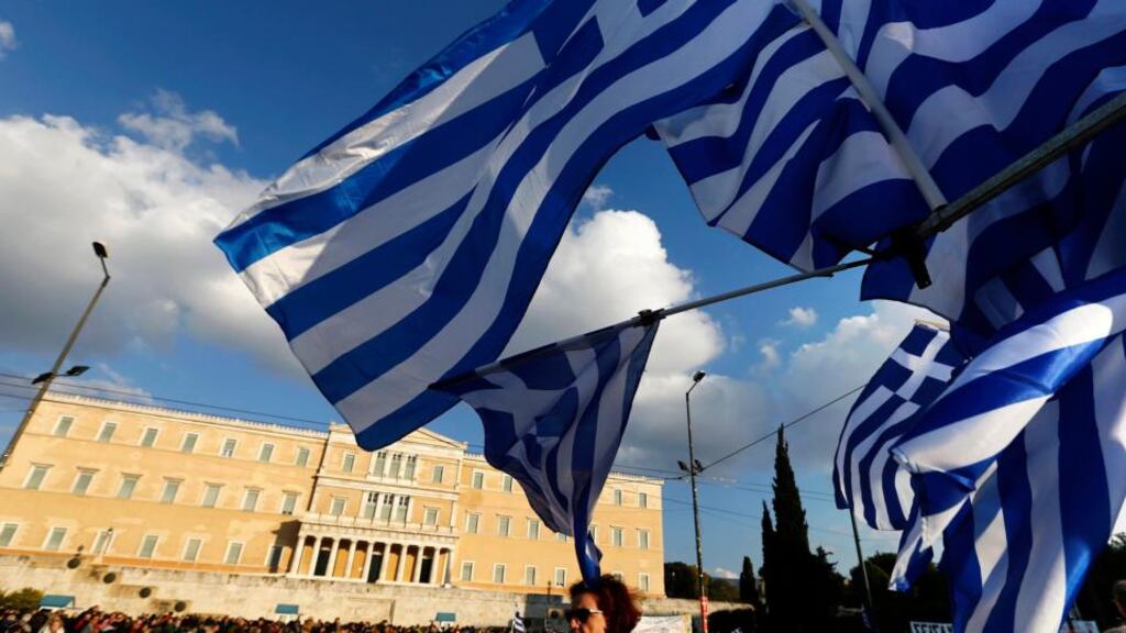 Protesters gather in front of parliament during an anti-austerity and pro-government demonstration in Athens on Sunday. Photograph: Reuters
