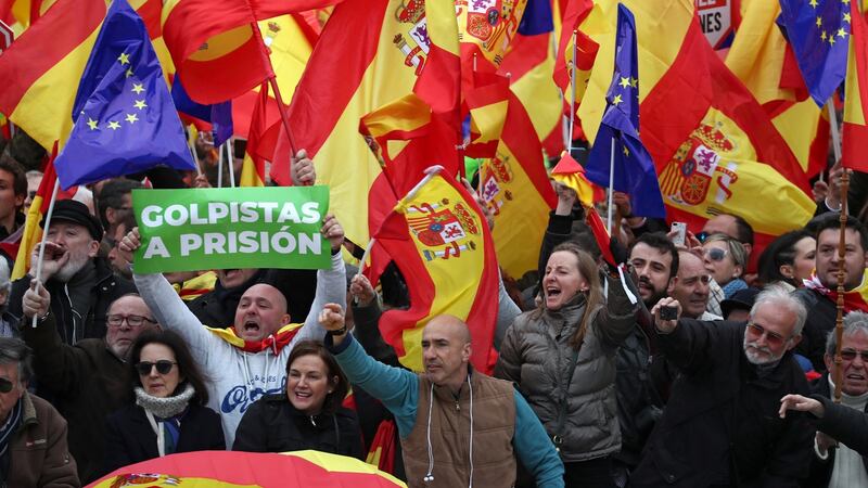 People gather during a protest called by right-wing opposition parties against Spanish prime minister Pedro Sanchez at Colon Square in Madrid. Photograph: Sergio Perez