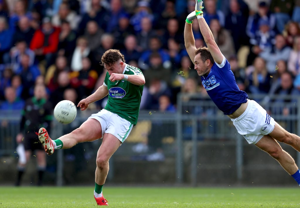 Naomh Conaill's AJ Gallagher attempts to block a shot from Gaoth Dobhair's Stiofán MacPháidin. Photograph: Leah Scholes/Inpho