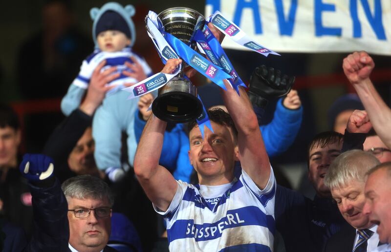 Castlehaven’s Mark Collins lifts the trophy after the Munster senior football final win over Dingle at TUS Gaelic Grounds. Photograph: James Crombie/Inpho