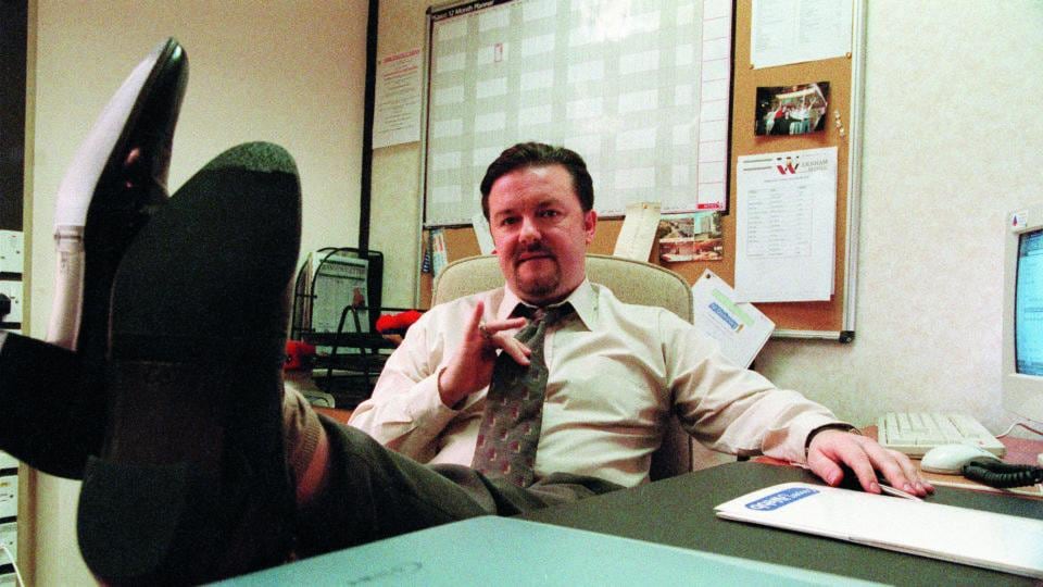Ricky Gervais in The Office: David Brent’s gesture with his tie says it all