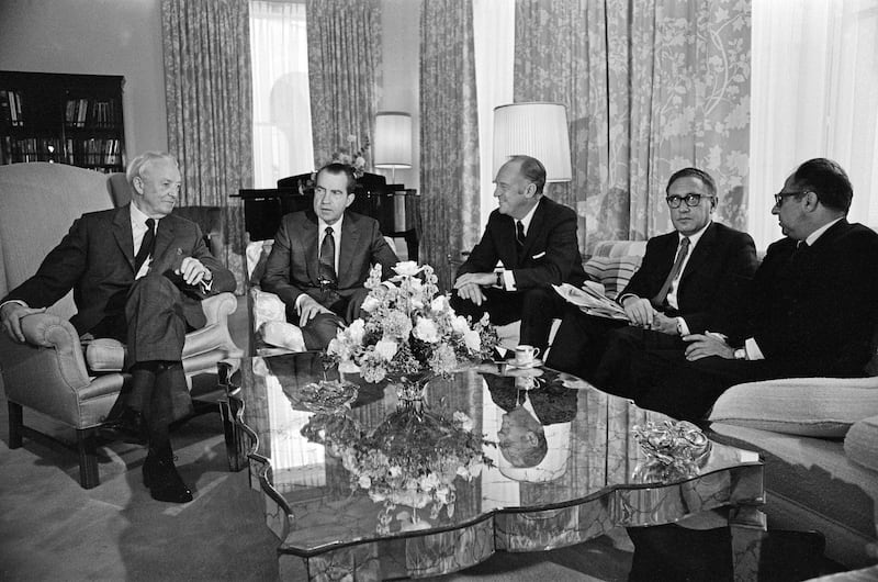 President Richard Nixon (second from left) and Henry Kissenger (second from right), along with diplomats David Bruce, William Rogers and Philip Habib, in Kilfrush House, Co Limerick, during a visit to Ireland in 1970. Photograph: Bill Kennedy/Mirrorpix/Getty Images