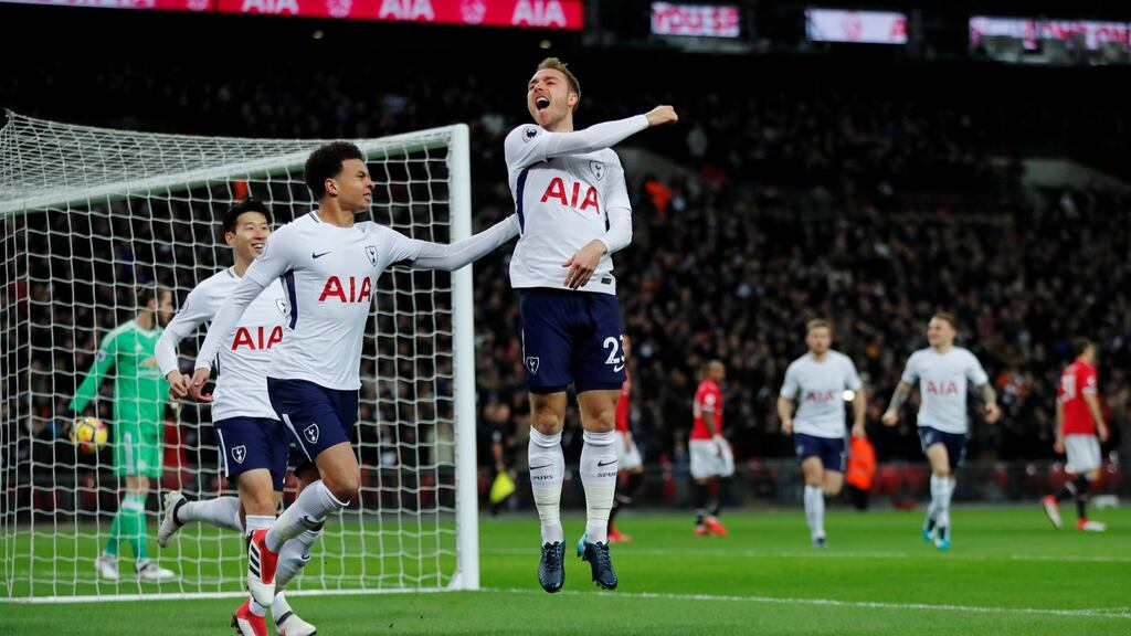 Tottenham’s Christian Eriksen celebrates with Dele Alli after scoring their first goal in the Premier League game against Manchester United at Wembley Stadium. Photograph: Eddie Keogh/Reuters